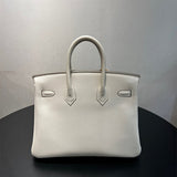  Understated handbag carried on shoulder