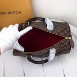Back view of classic polished women's handbag – women's luxury handbag