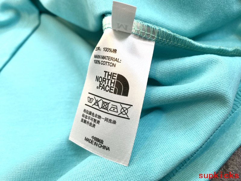 Close-up detail shot of Rhude luxury clothing with logo-detail design