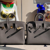Side view of polished structured handbag