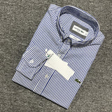 Full styled look of Lacoste luxury clothing with monogram-inspired silhouette