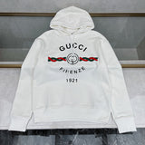 Front view of Gucci luxury clothing with logo-detail design