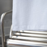 Flat lay presentation of Louis Vuitton cotton t-shirt with monogram-inspired silhouette