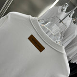 Side profile of Louis Vuitton luxury clothing with relaxed-fit cut