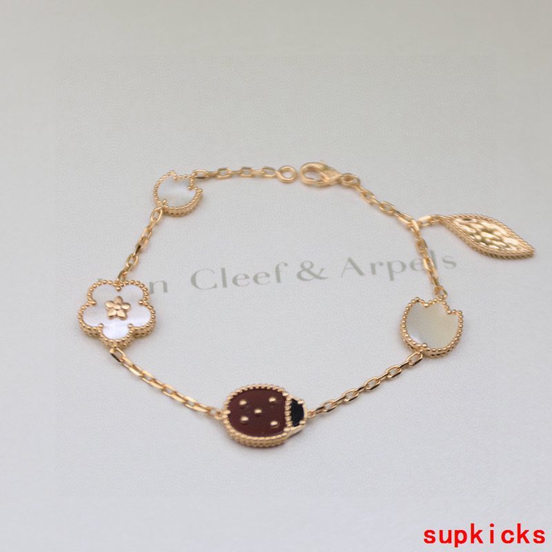 Lifestyle view of Van Cleef & Arpels unisex jewelry piece