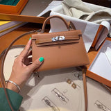  Signature crossbody bag carried on shoulder 16
