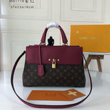Side profile of chic elevated women's handbag – women's luxury accessory