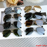 Lifestyle view of Louis Vuitton unisex sunglasses