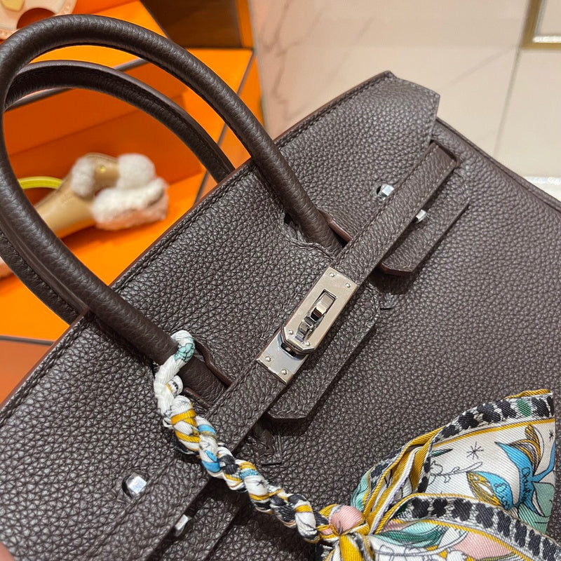 Side view of classic structured handbag
