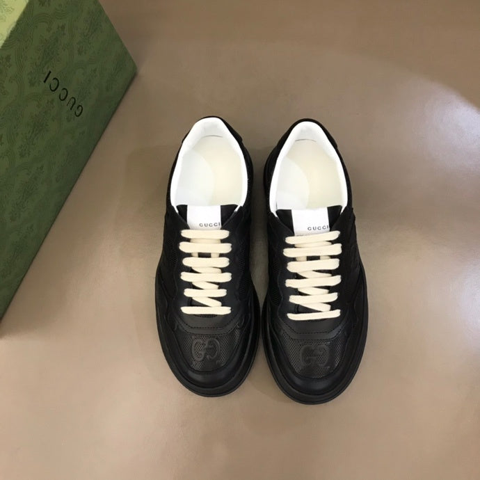 Side profile of Gucci crisp white sneakers low-top design