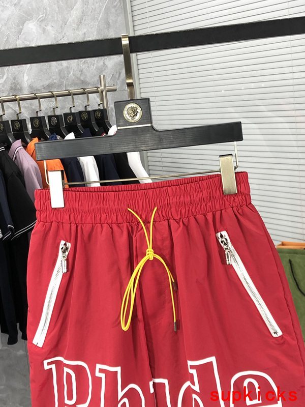 Close-up detail shot of Rhude luxury clothing with logo-detail design