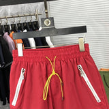 Close-up detail shot of Rhude luxury clothing with logo-detail design