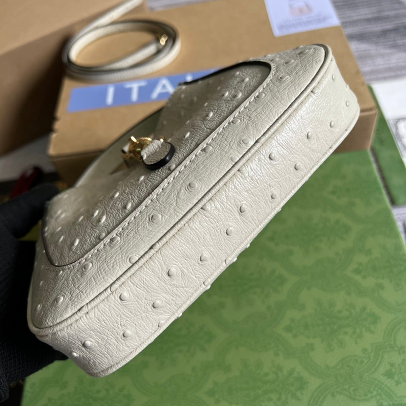 Styled lifestyle shot of polished statement women's handbag – women's luxury accessory