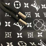 Flat lay presentation of Louis Vuitton cotton t-shirt with runway-inspired design