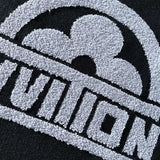 Flat lay presentation of Louis Vuitton luxury clothing with logo-detail design