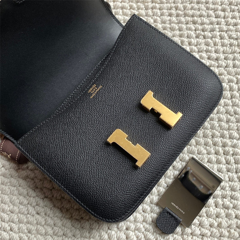 Side view of poised structured handbag