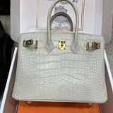 Side view of understated structured handbag