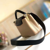 Close-up detail of signature modern women's handbag – women's luxury handbag