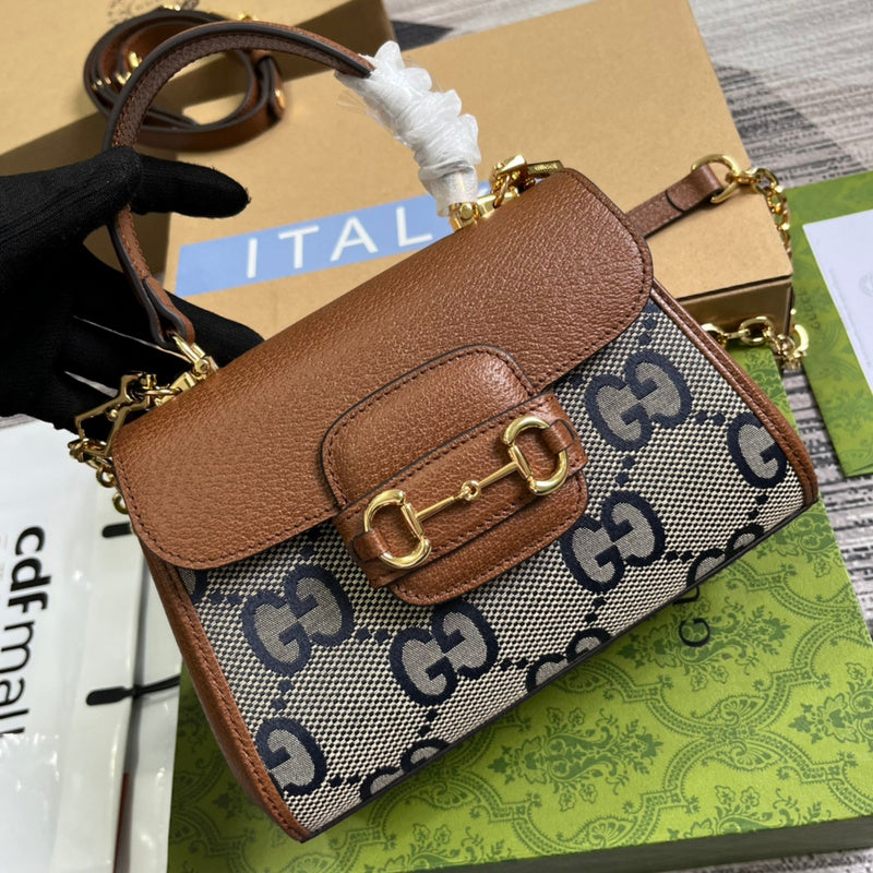 Back view of sleek premium women's handbag – women's luxury accessory