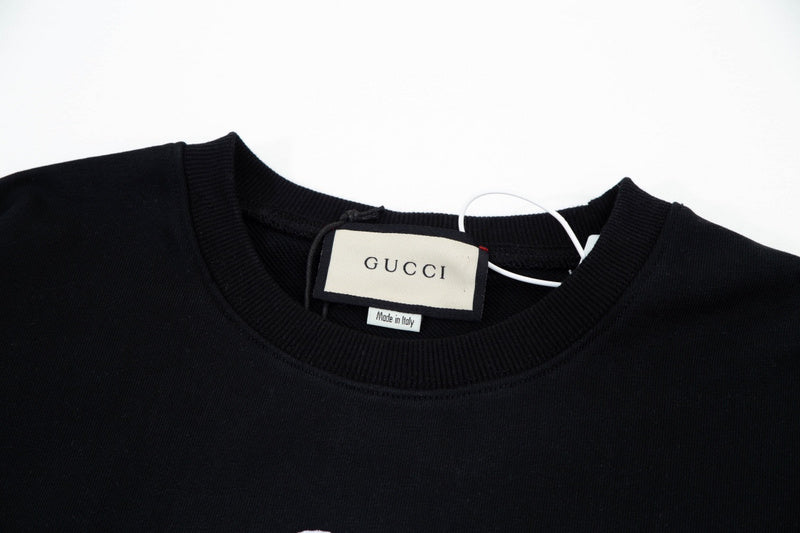 Close-up detail shot of Gucci luxury clothing with contemporary cut