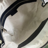 Side profile of premium modern women's handbag – women's statement bag