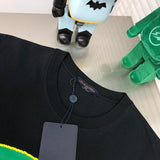 Close-up detail shot of Louis Vuitton cotton t-shirt with logo-detail design