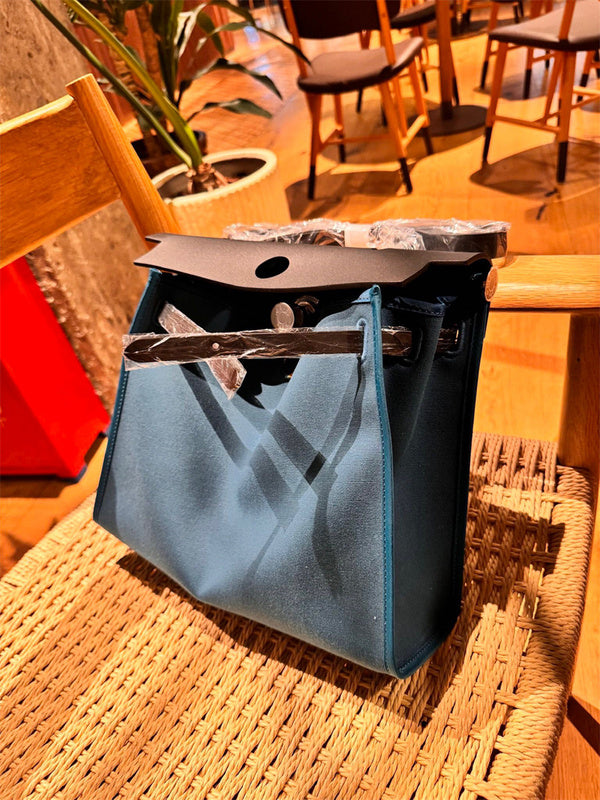  Clean-Lined handbag carried on shoulder 16