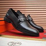 Hermes shoes Style 069 - close-up of classic monogram styling