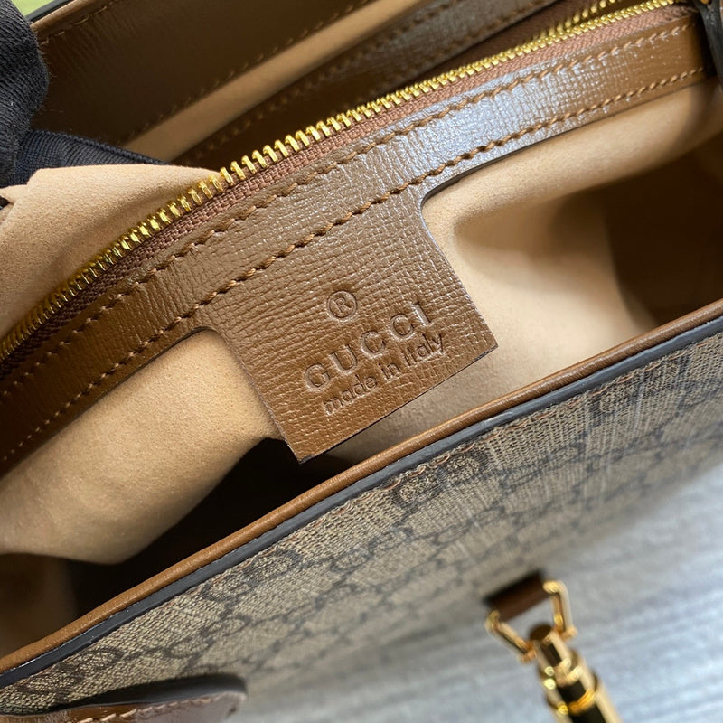 Side profile of polished everyday-luxe women's handbag – women's luxury accessory