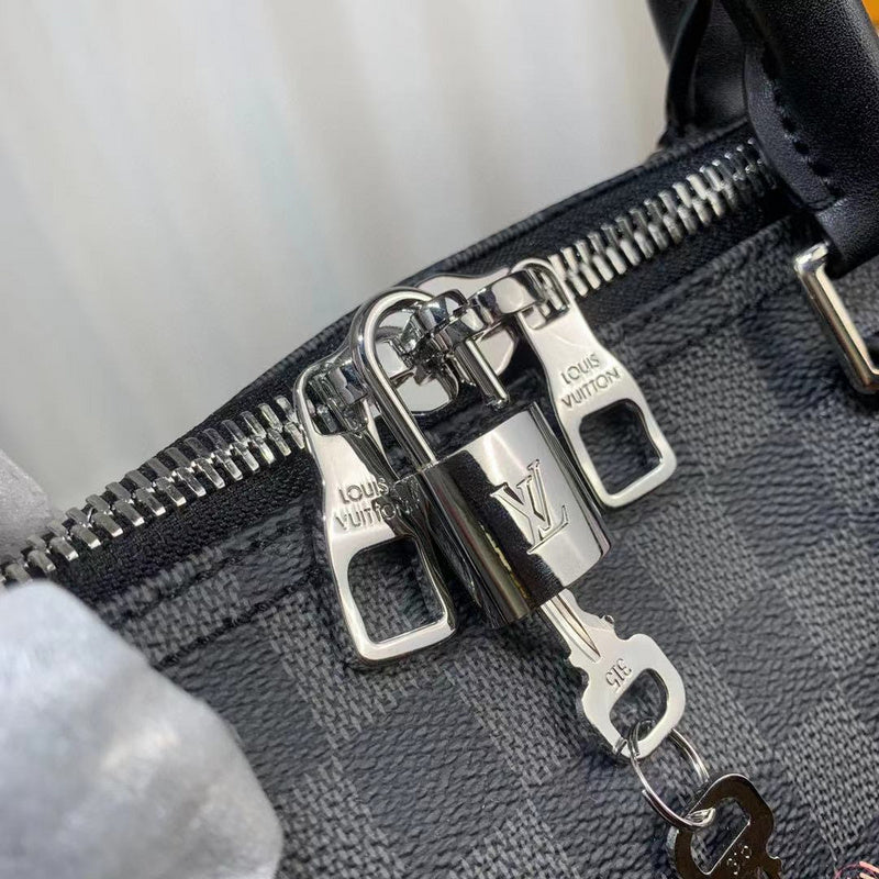 Handle and strap detail of everyday-luxe statement women's handbag – women's everyday handbag