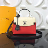 Side profile of polished refined women's handbag – women's statement bag