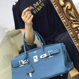 Side view of smart structured handbag