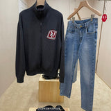 Front view of Louis Vuitton luxury clothing with contemporary cut