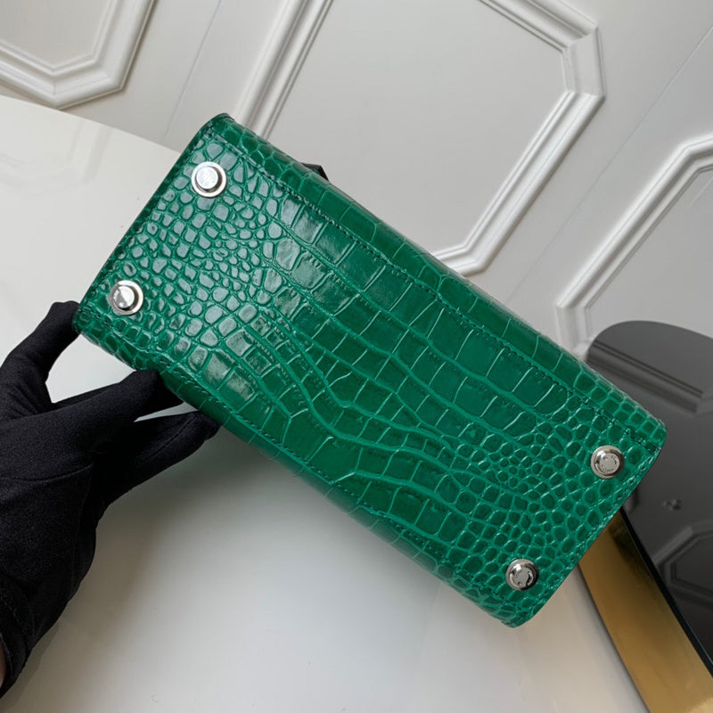Styled lifestyle shot of everyday-luxe classic women's handbag – women's luxury handbag