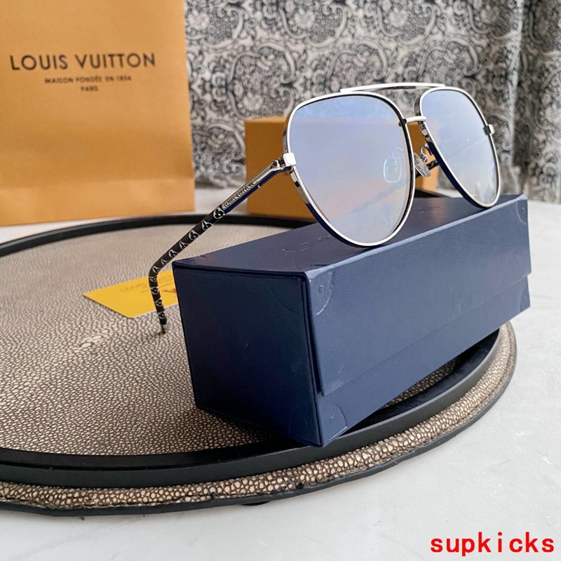 Close-up detail view of Louis Vuitton unisex sunglasses
