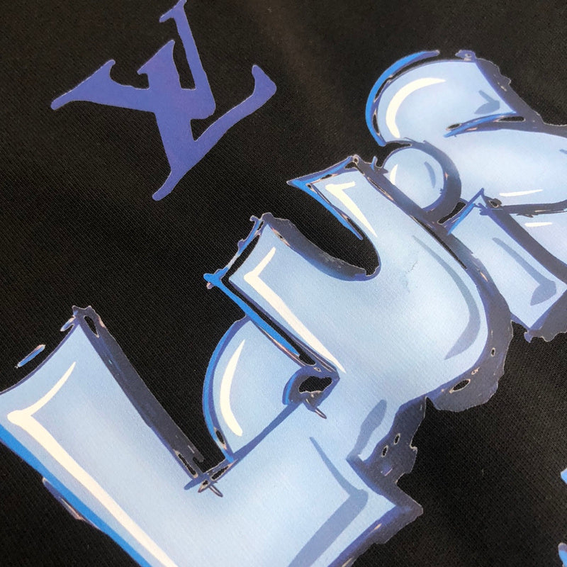 Flat lay presentation of Louis Vuitton cotton t-shirt with label-forward styling