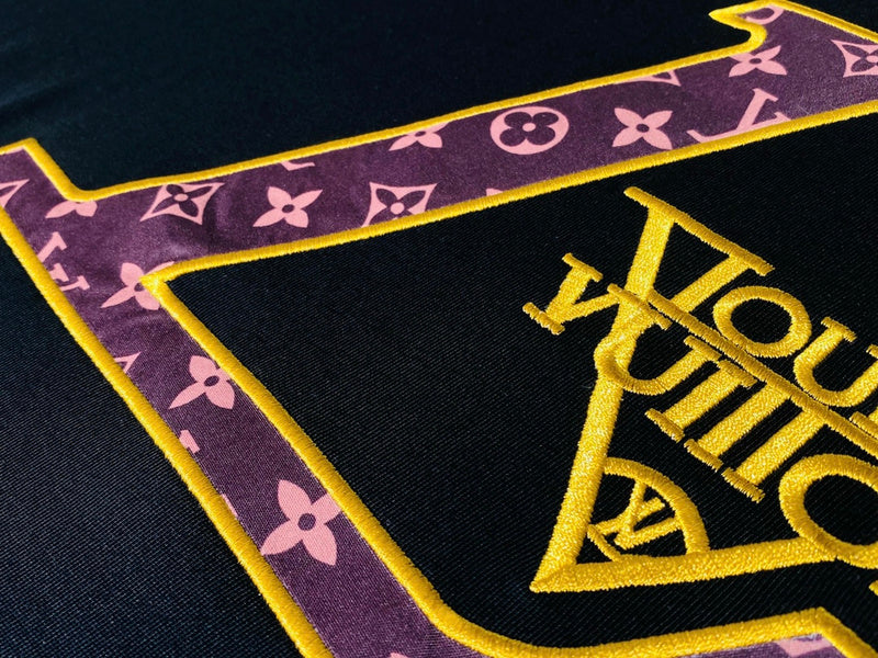 Flat lay presentation of Louis Vuitton cotton t-shirt with contemporary cut