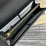 Side profile of sleek refined women's handbag – women's statement bag