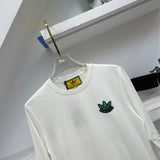 Flat lay presentation of Gucci luxury clothing with logo-detail design