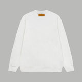 Side profile of Louis Vuitton luxury clothing with signature branding
