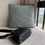 Styled lifestyle shot of chic signature women's handbag – women's everyday handbag