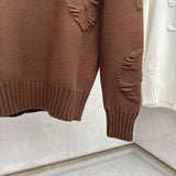 Front view of Louis Vuitton luxury clothing with tailored silhouette