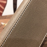  chic top-handle bag styled with outfit
