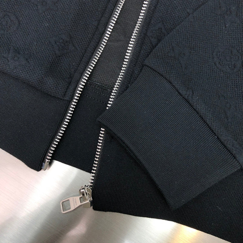 Front view of Louis Vuitton luxury clothing with signature branding
