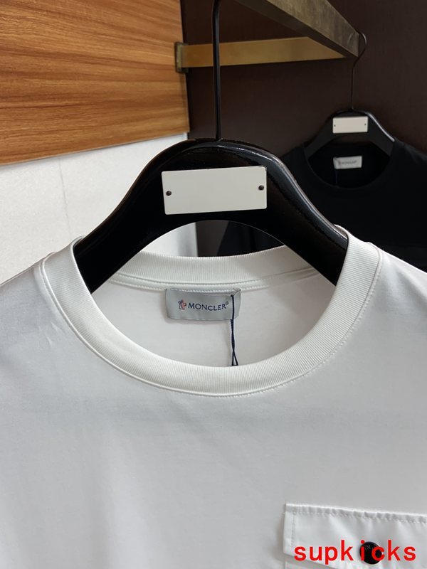 Close-up detail shot of Moncler luxury clothing with contemporary cut