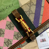 Back view of polished signature women's handbag – women's statement bag