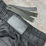 Side profile view of Amiri luxury piece style No.055