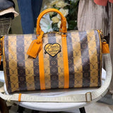 Front view of refined elevated women's handbag – women's luxury accessory