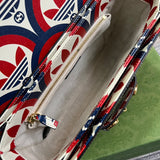 Close-up detail of modern signature women's handbag – women's luxury handbag