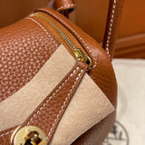 Side view of poised structured handbag